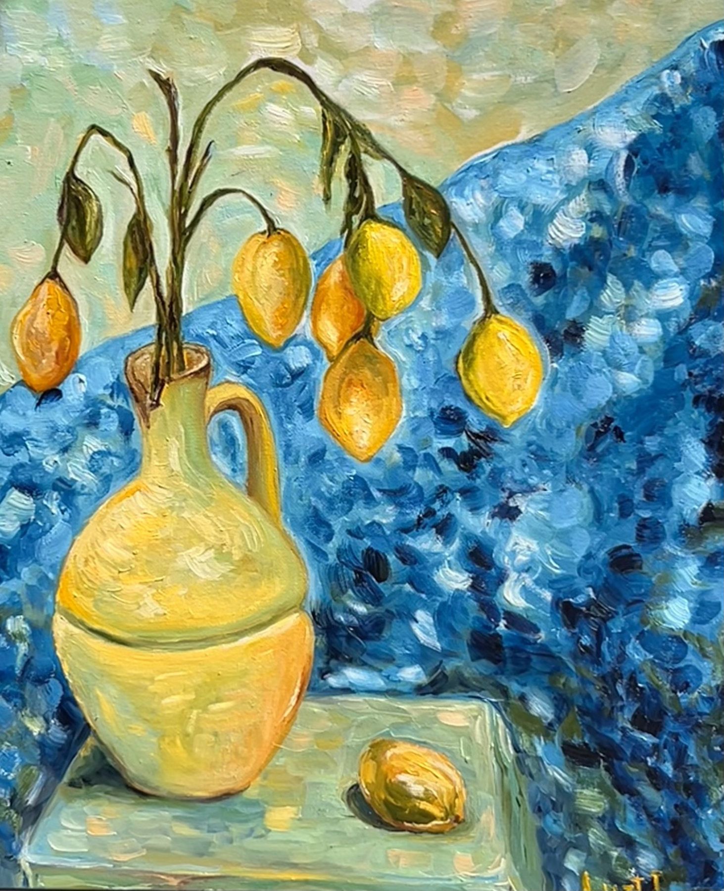 Yellow lemons on drooping branches in a pale ceramic jug against a vivid blue background.
